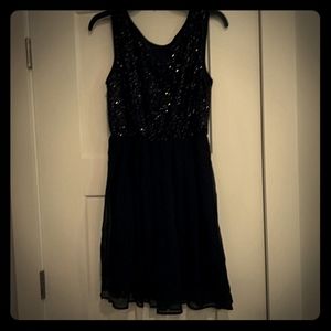Black short sequin and chiffon zip back dress